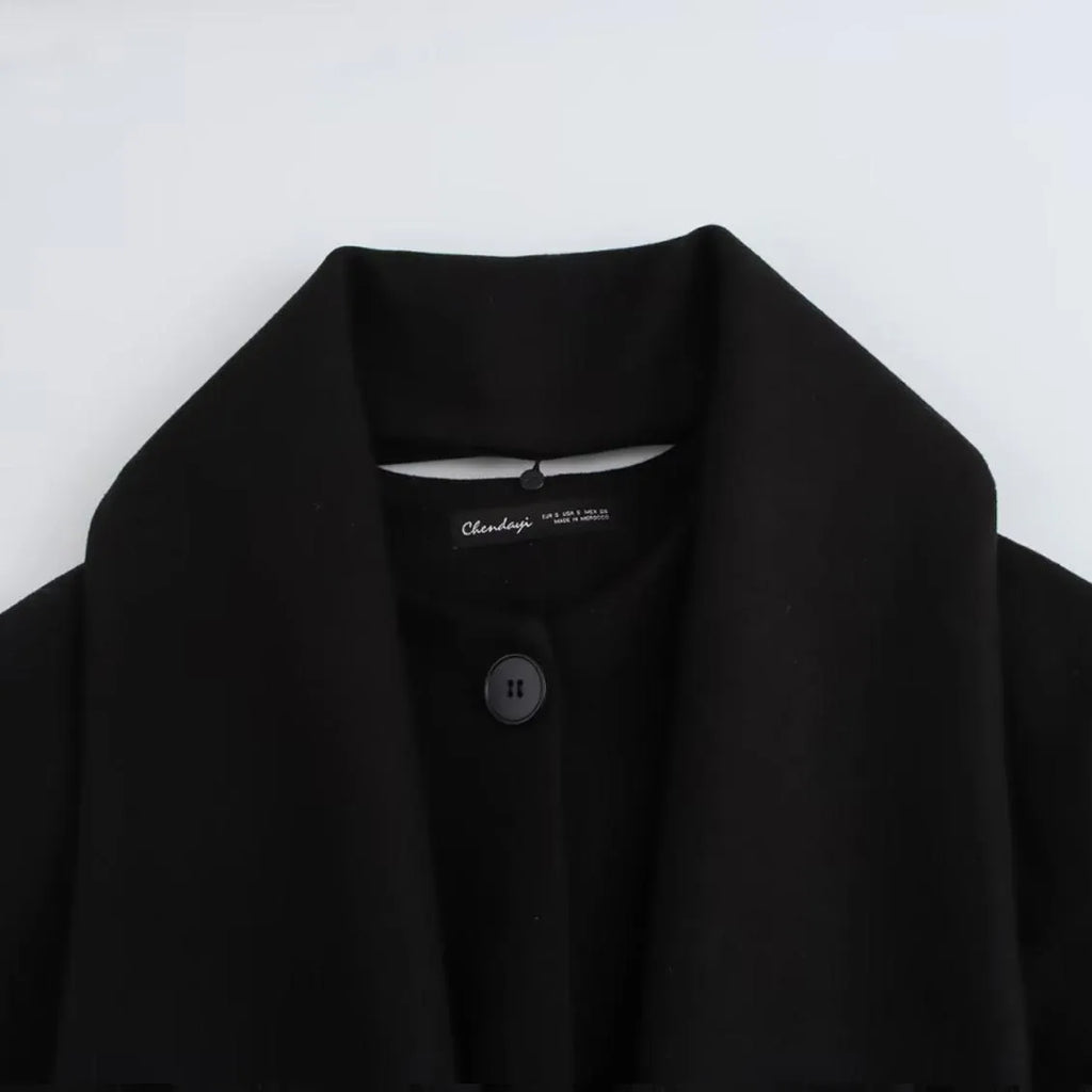 Women's longline polyester coat with artificial fur collar in street fashion style, shown in a choice of colours.