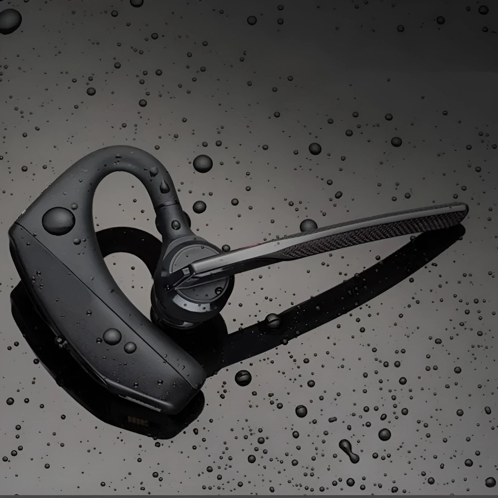 Black plastic stereo Bluetooth sports headphones with a visible battery display.