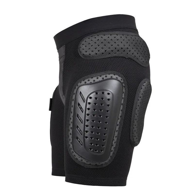 Black cycling hip protection pants showing the integrated protective pad, available in sizes S, M, L, and XL.