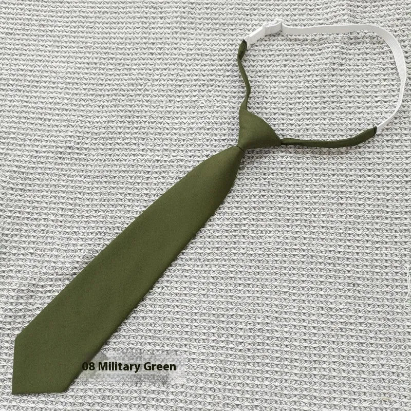 Navy blue cotton bow tie with arrow style design measuring 35cm by 7cm
