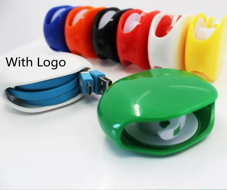 Automatic earphone cable winder retractor in multiple colours showing compact size