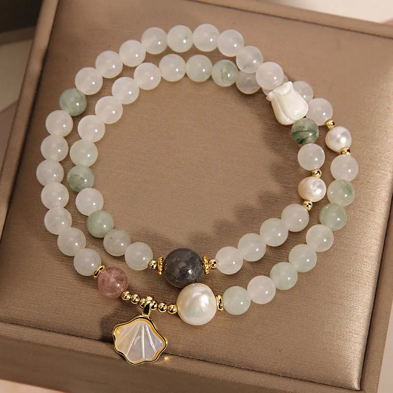 Women's crystal bracelet with Tianshan jade ginkgo leaf pendant and gold-plated setting