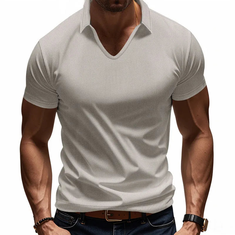 Men's loose fit V-neck short sleeve T-shirt in a light blue solid colour.