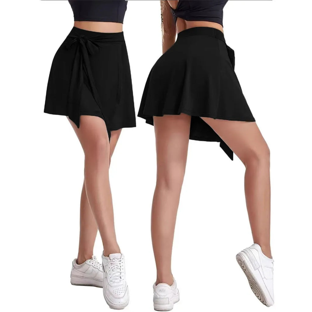 Black thigh-length anti-exposure sports skirt with built-in shorts showing high waist and shoulder strap details