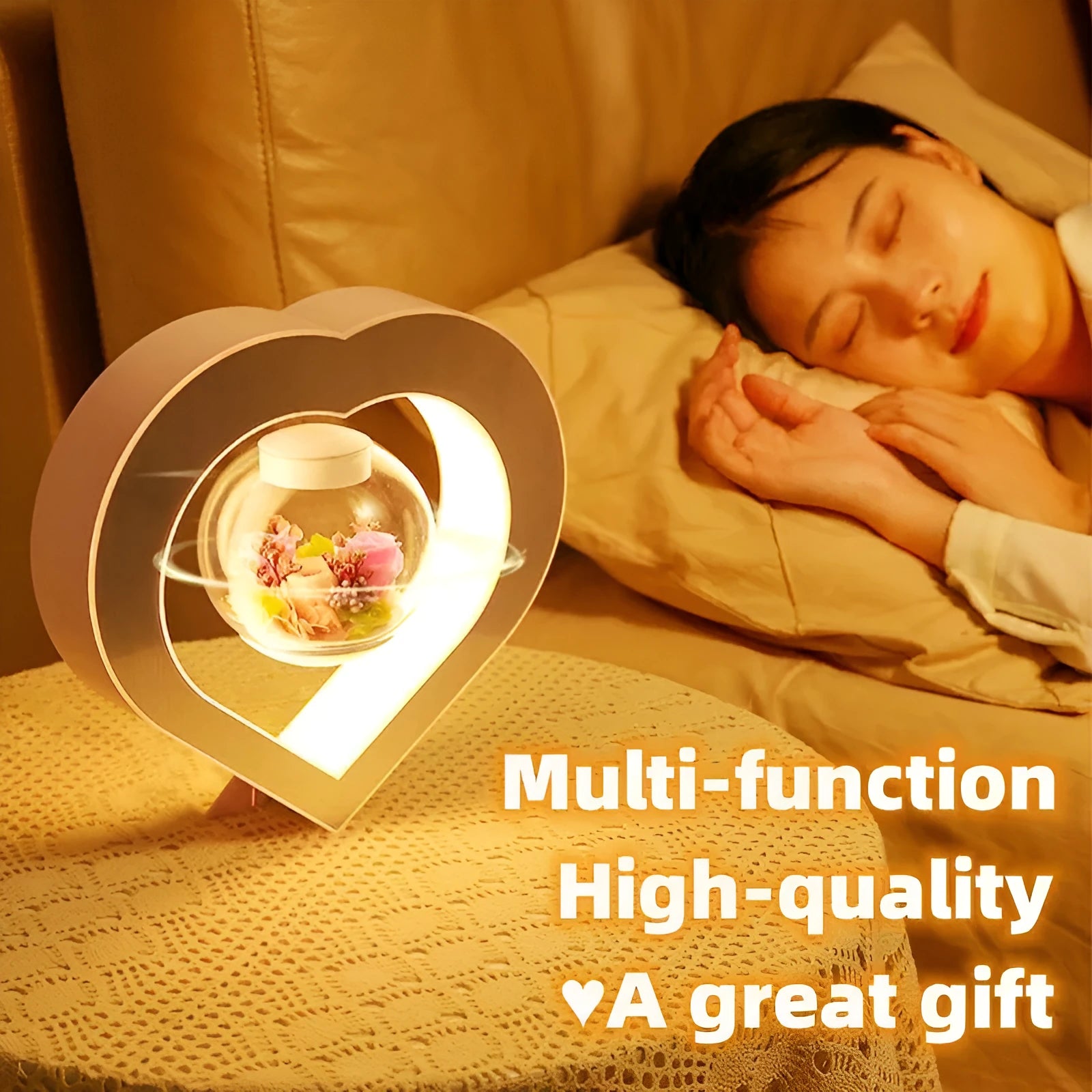 Magnetic levitation heart lamp with preserved pink rose floating above a stable stand, LED night light, home decor