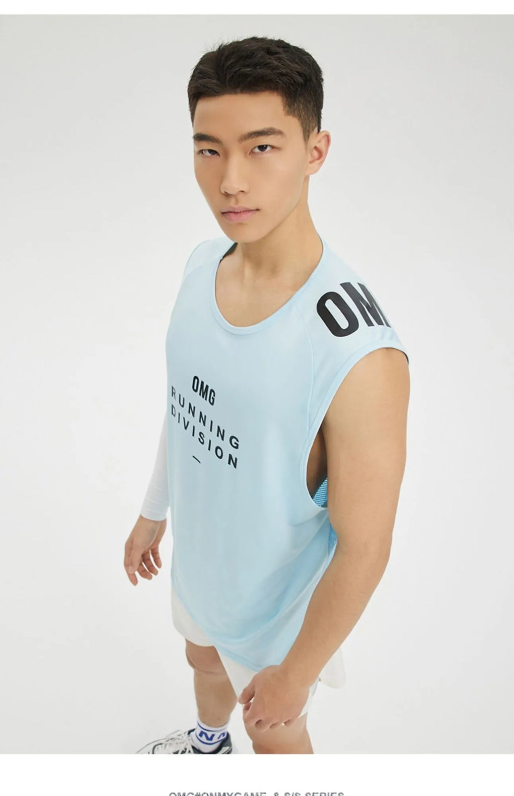 Man wearing a lightweight grey mesh sports vest for fitness training