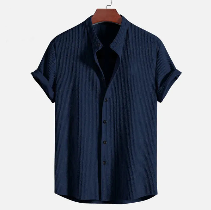 Men's loose short sleeve summer shirt in polyester available in multiple colours.