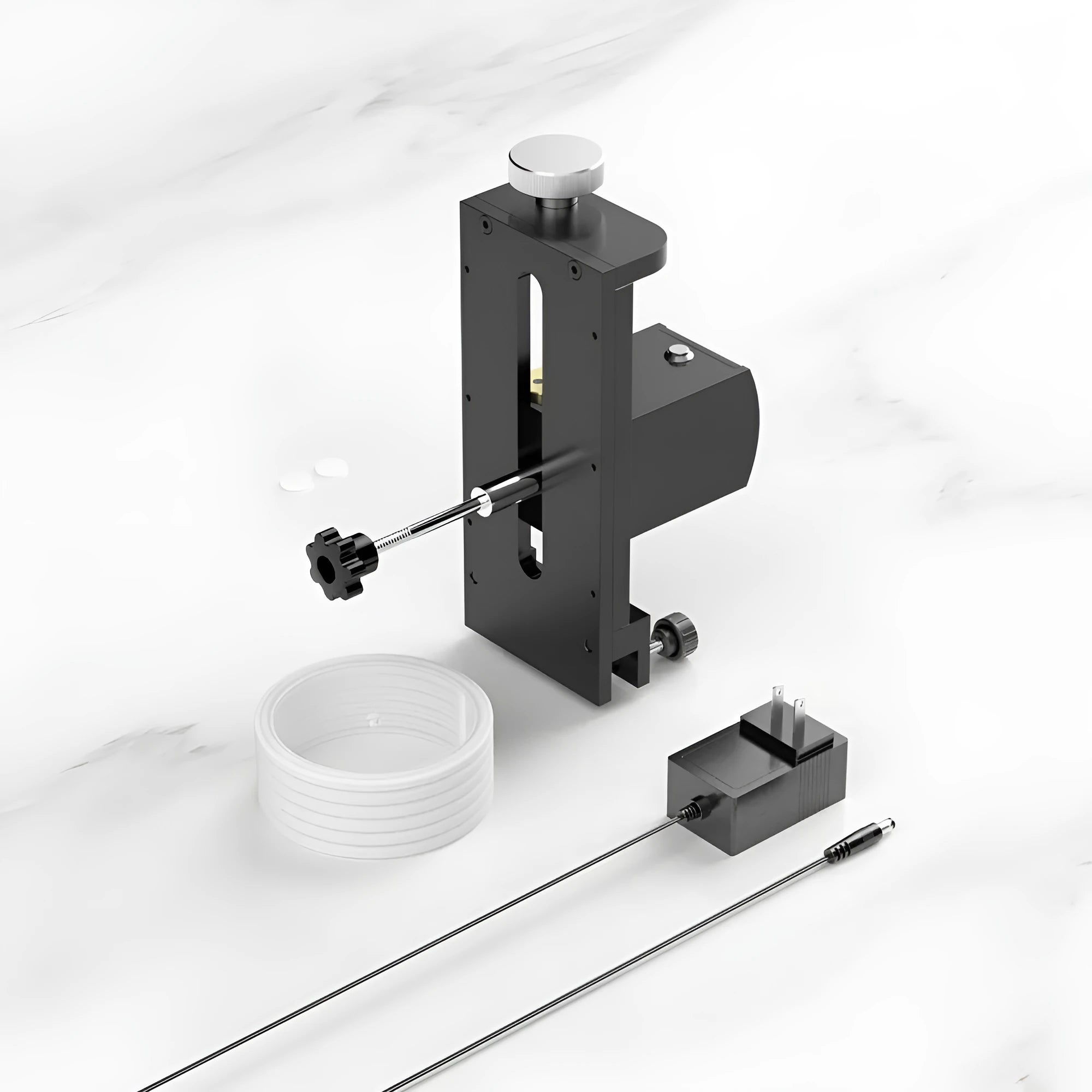 Compact single-slot ultrasonic cleaning machine for vinyl records and printed circuit boards on a workbench.