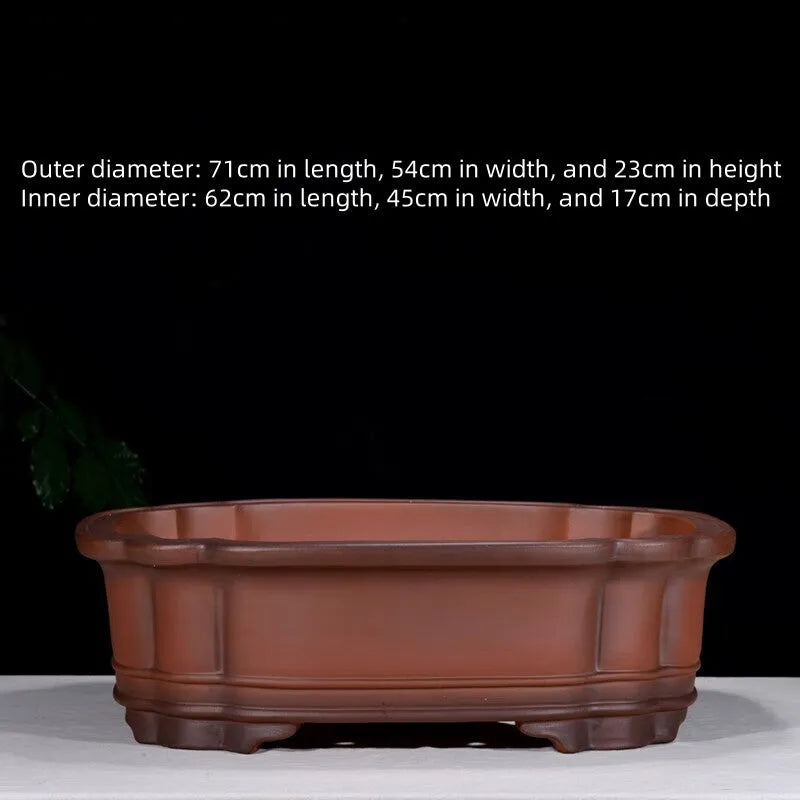 Large antique Chinese style purple clay flower pot with tree stump design and decorative botanical relief