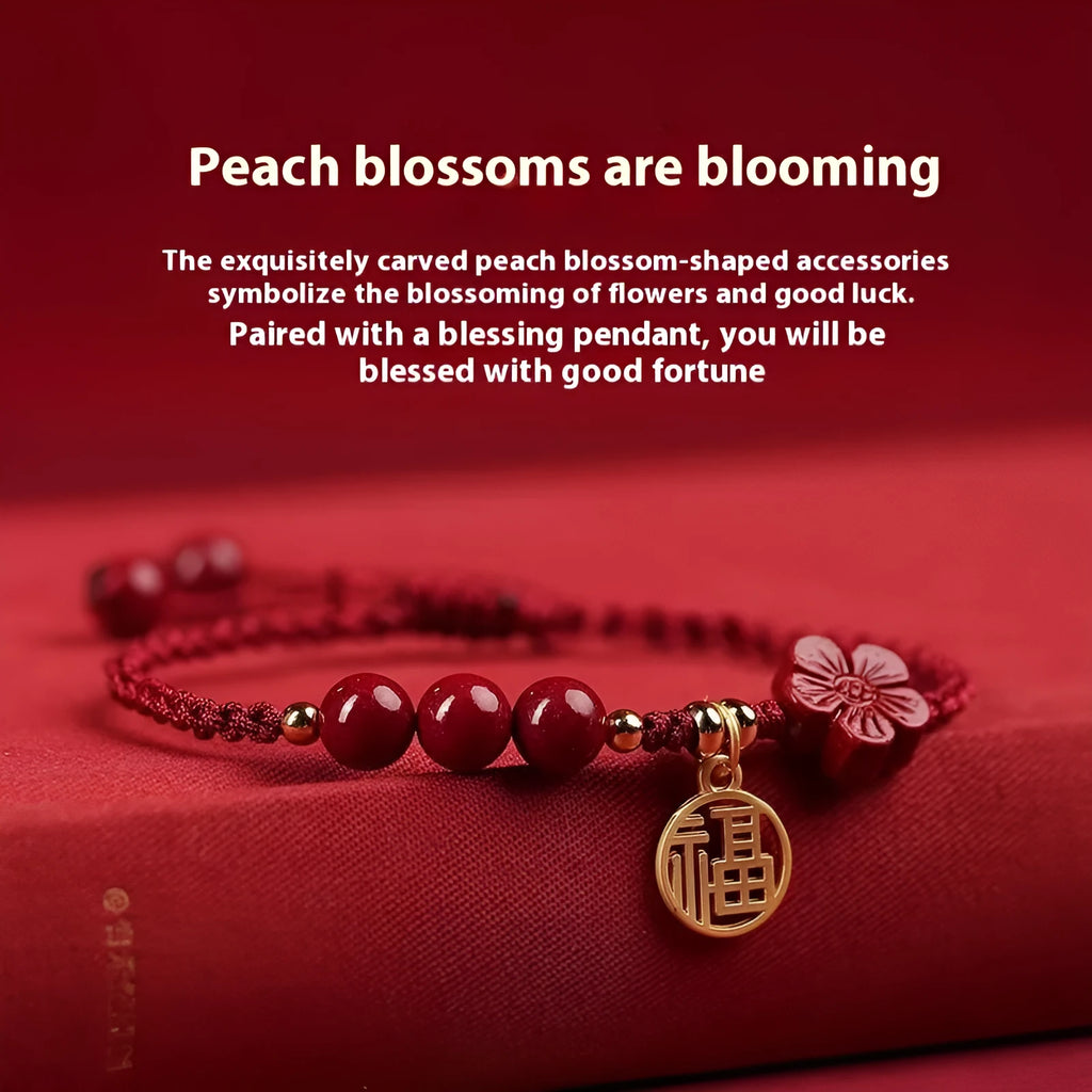 Cinnabar birth year braided rope bracelet with round bead blessing card in wine red colour on a plain background.