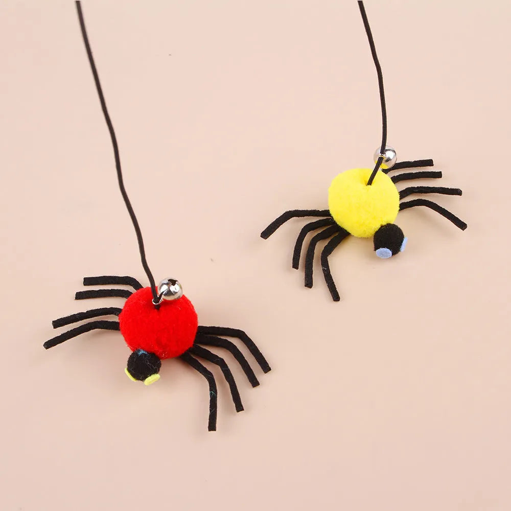 Hanging door cat toy with feather stick, bell, and spider attachment on elastic rope