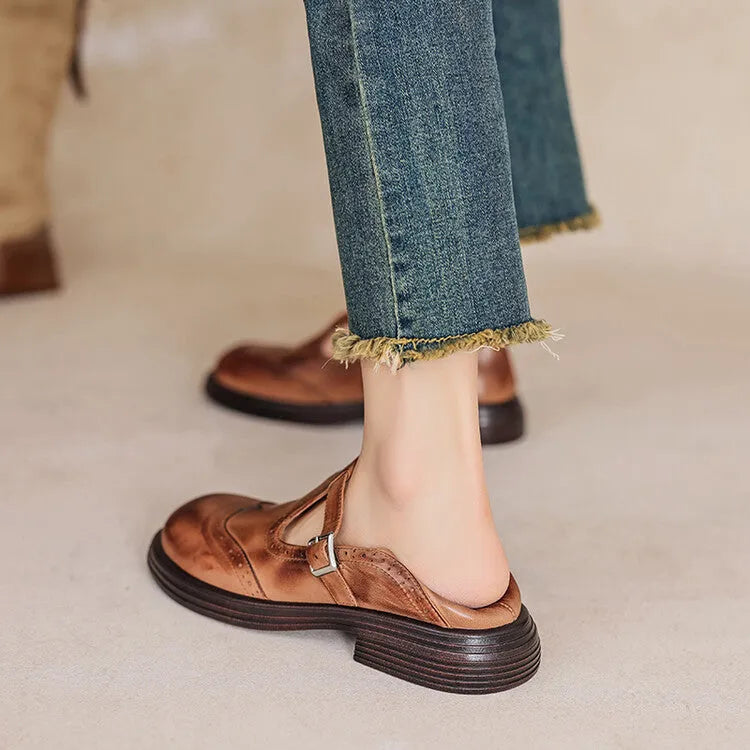 Women's black flat shoes with sheepskin upper, round toe, and flat sole in British style
