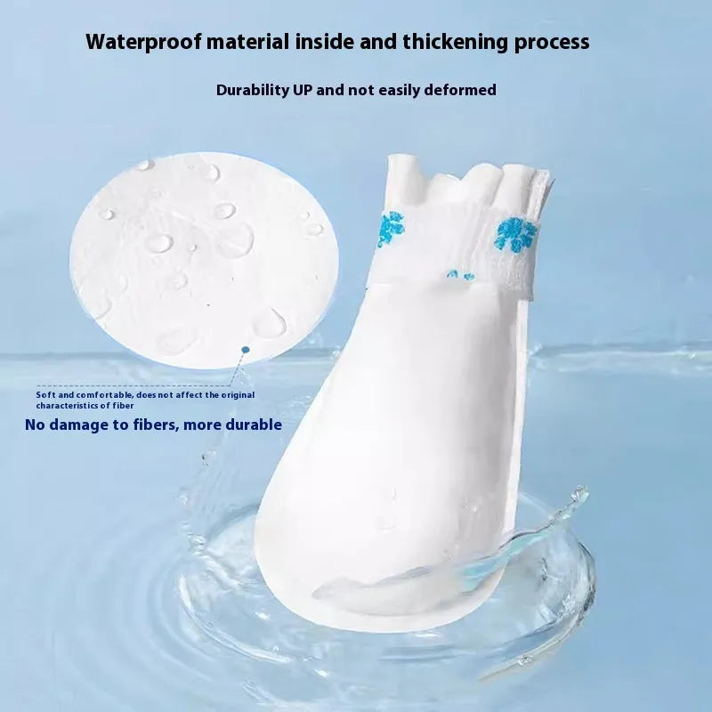 Disposable white waterproof non-slip pet shoe covers made from non-woven fabric
