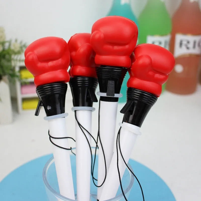 Four boxing press ejection pens with plug-in sleeve mechanisms and 0.7mm bullet tips