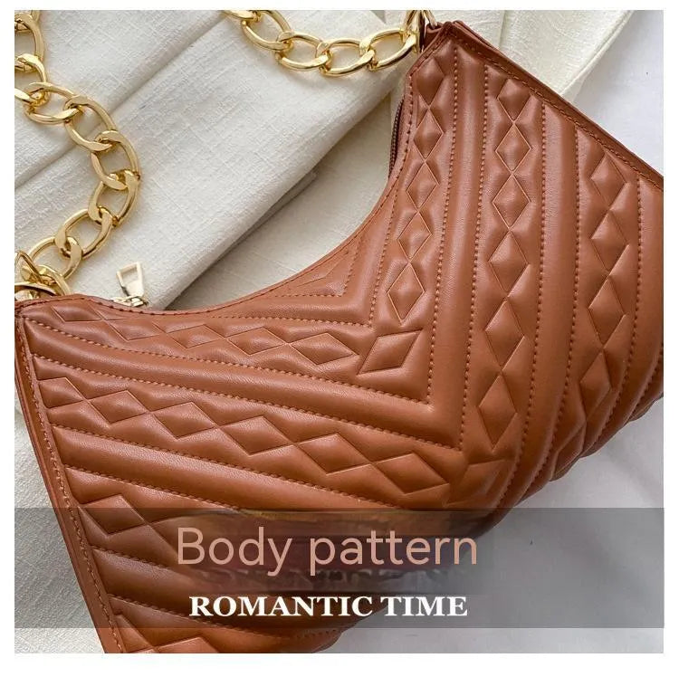 Brown PU leather pleated chain baguette shoulder bag with single strap showing vertical square shape