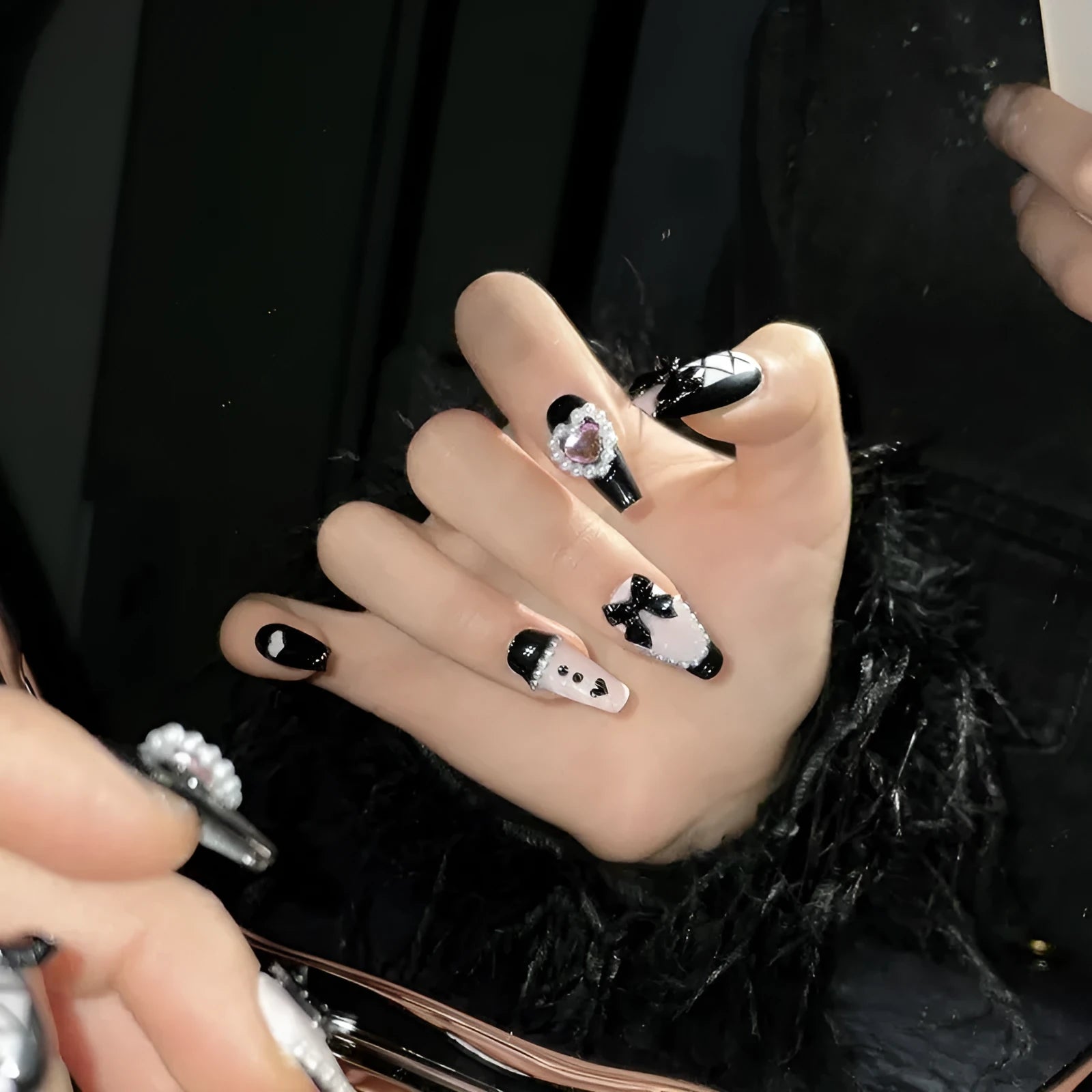 Black peach heart detachable manicure nails with hand-painted bow and XINGX patterns