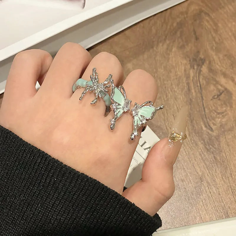 Creative Chinese butterfly women's copper ring with oil-dripping surface treatment in split ring design.