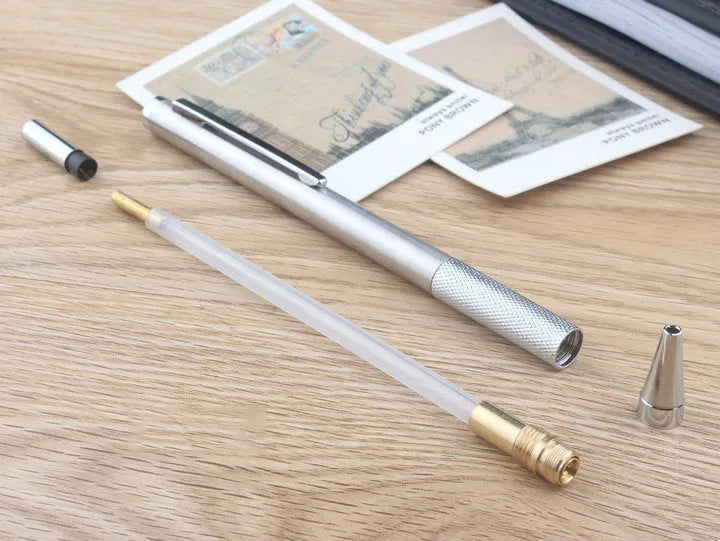 Metal automatic mechanical pencil with a choice of lead sizes including 0.5mm and 0.7mm, shown with a 2B refill.