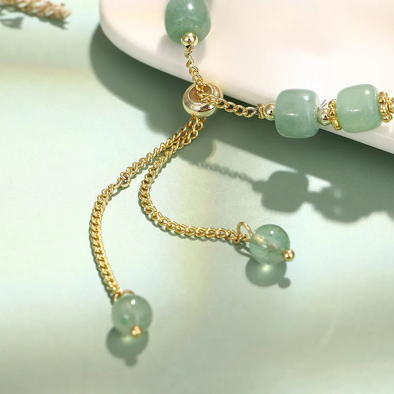 Personality New Temperament Rabbit Bracelet in green aventurine or strawberry quartz natural stone with gold-plated copper accents
