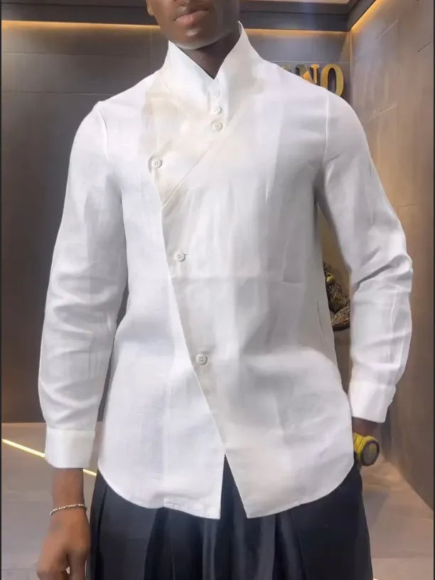White asymmetric front long sleeve shirt and black pleated pants set on display