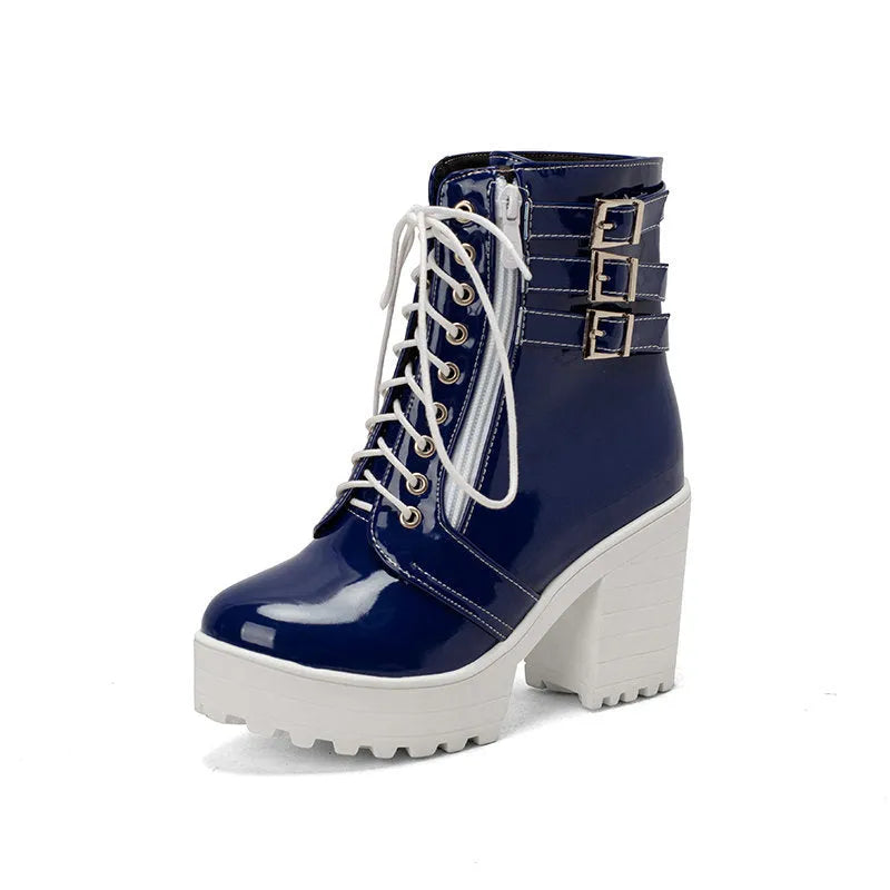 Women's black thick-heeled short boots with lace-up front and round toe, showing waterproof platform detail