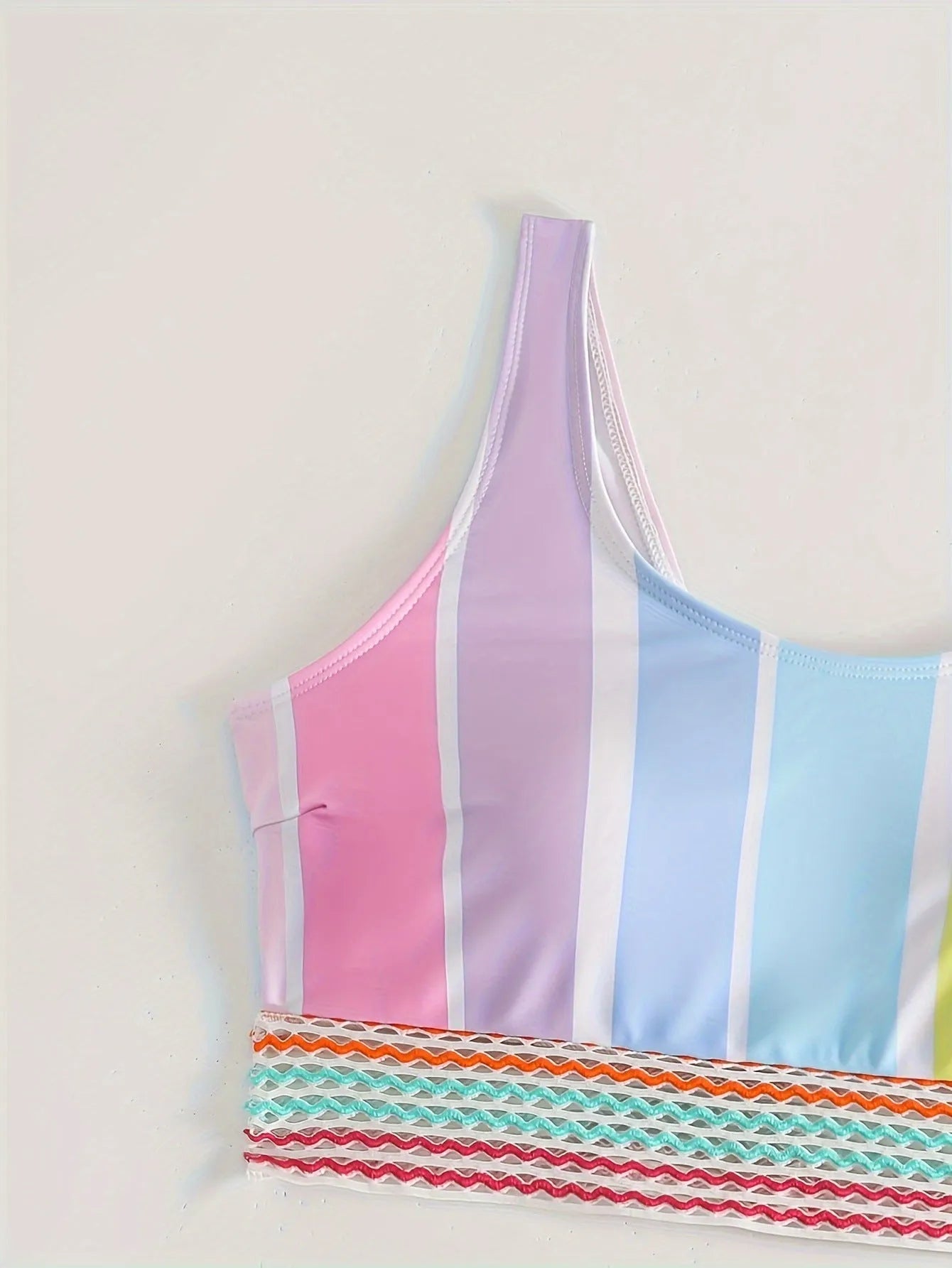 Women's striped bikini swimwear set with top and briefs for swimming and water sports