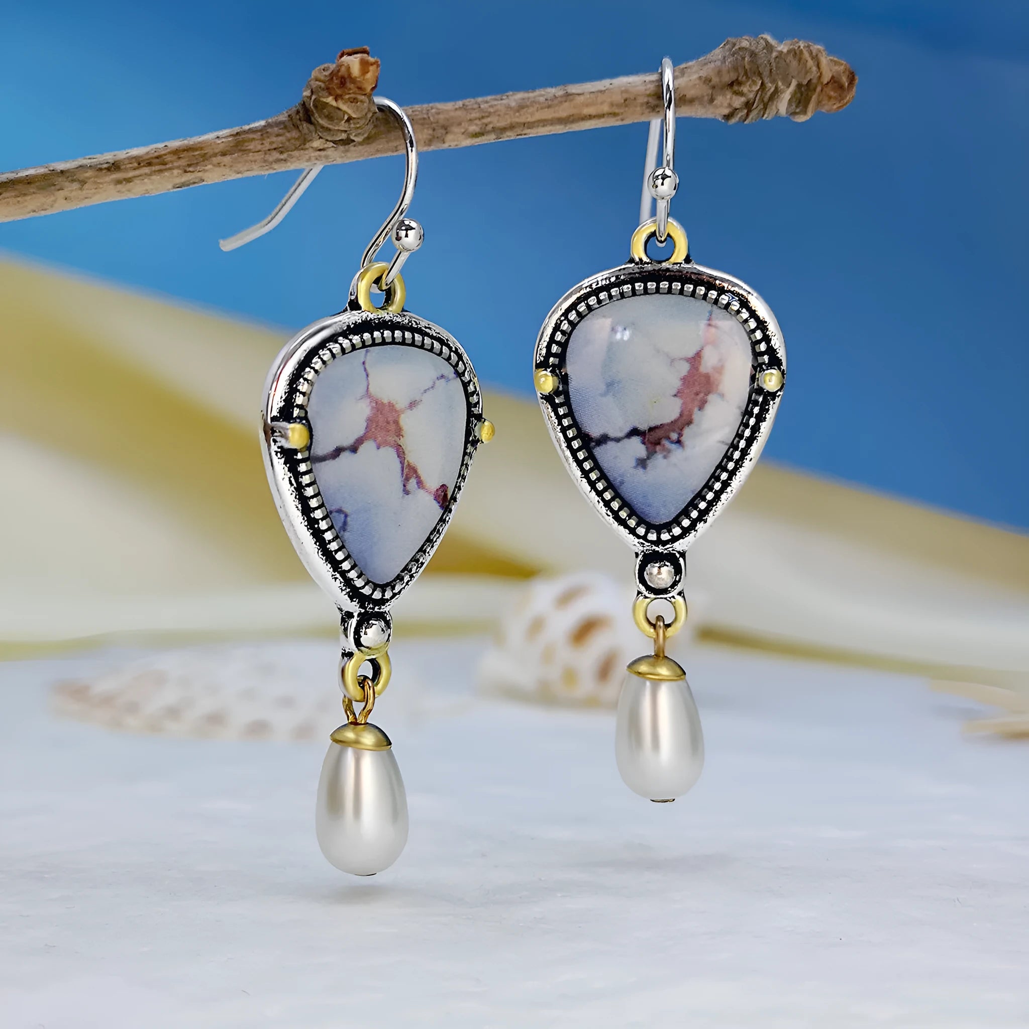 Retro blue drop earrings with geometric Bohemian design featuring synthetic opal and pearl accents
