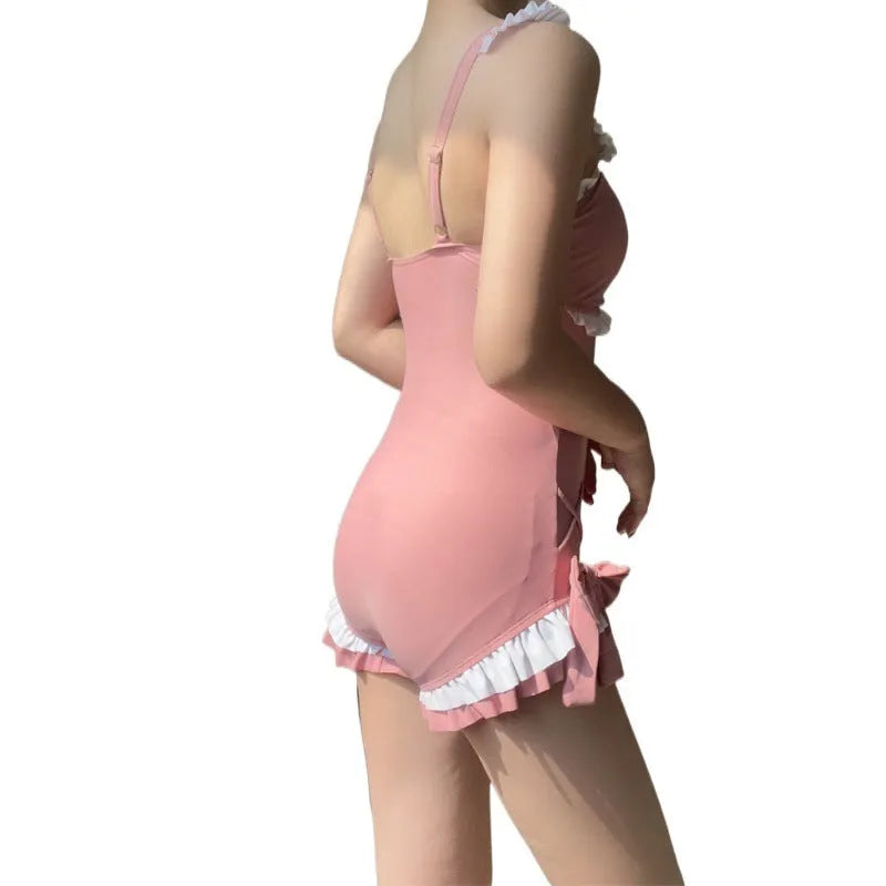 Women's one-piece sun protection swimsuit in milk silk fabric, solid colour pink, sleeveless design