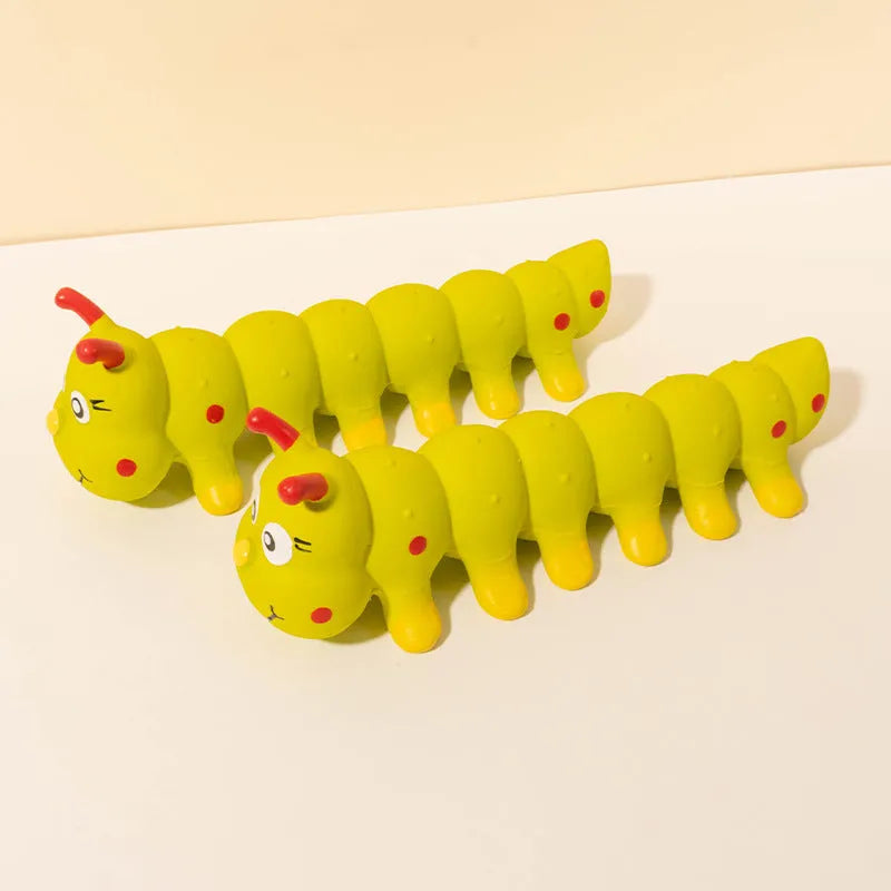 Yellow rubber caterpillar squeaky dog toy measuring 25.5x9cm for small and medium dogs