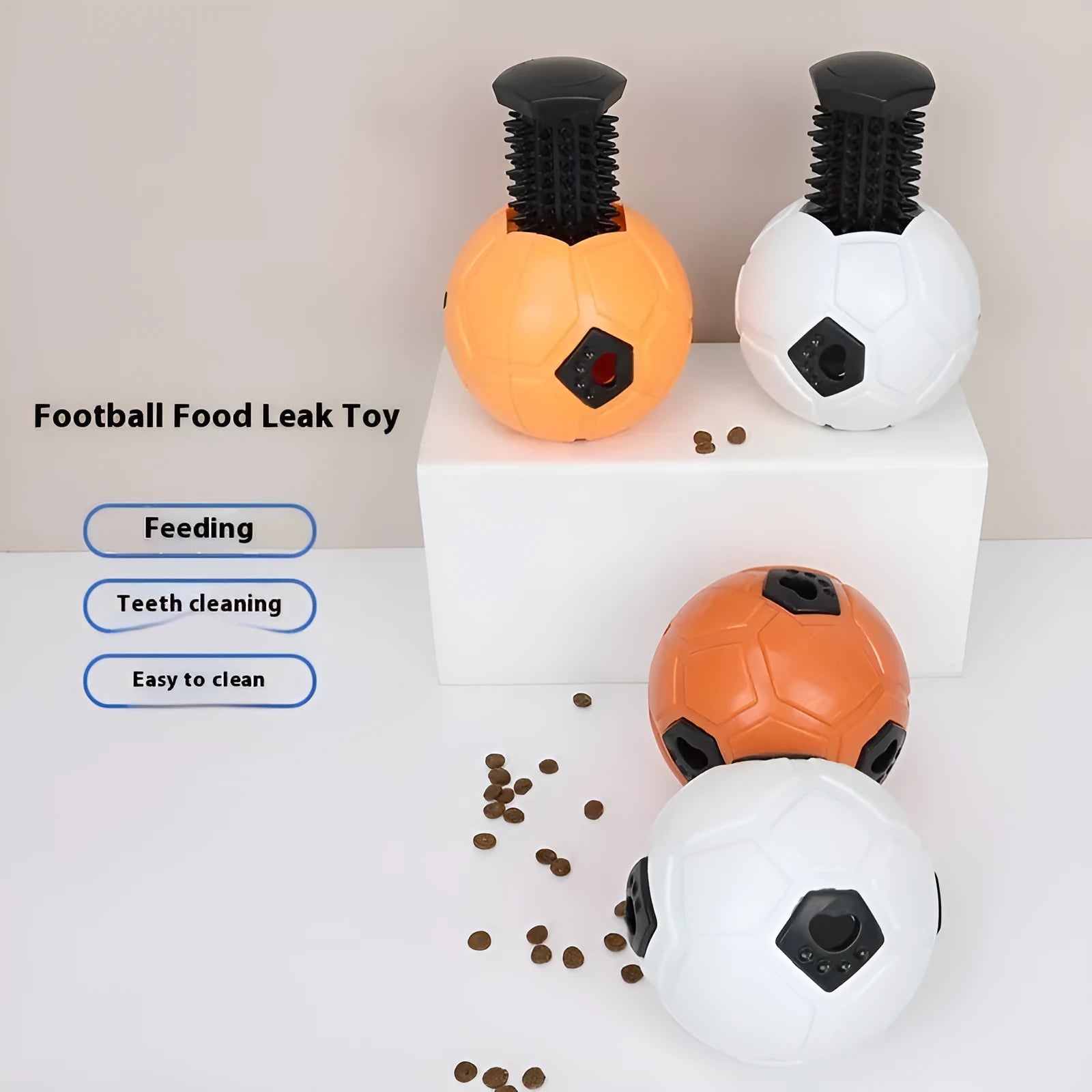 Orange hollow style TPR dog toy ball for nibbling and teeth grinding on a neutral background