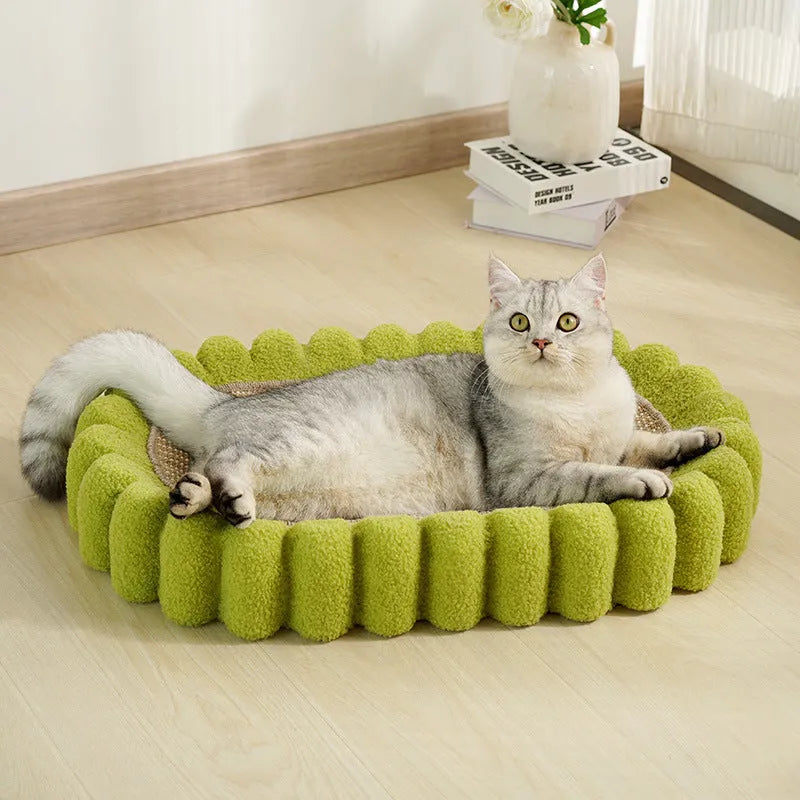 Green oval cat scratch pad bowl measuring 650mm serving as scratching board and cat bed