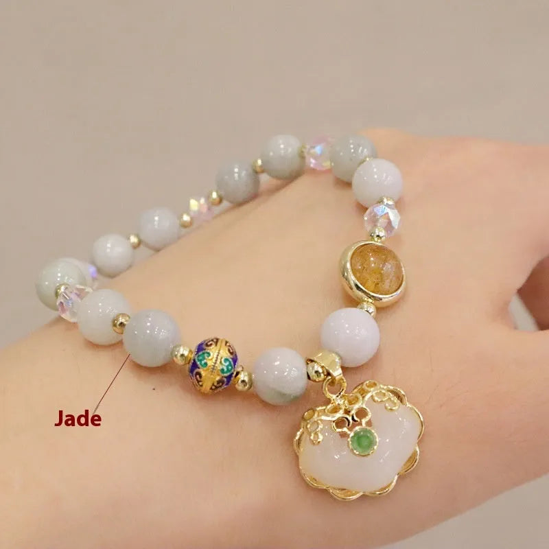Women's jade geometric bracelet with metal ethnic decoration in Gray Jade and Strawberry Quartz