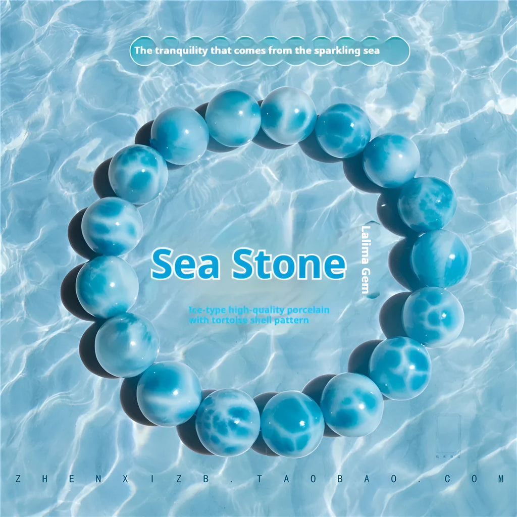 Blue handmade Bodhi bracelet with sea-pattern crystal stone and pearl accent in Maillard style.