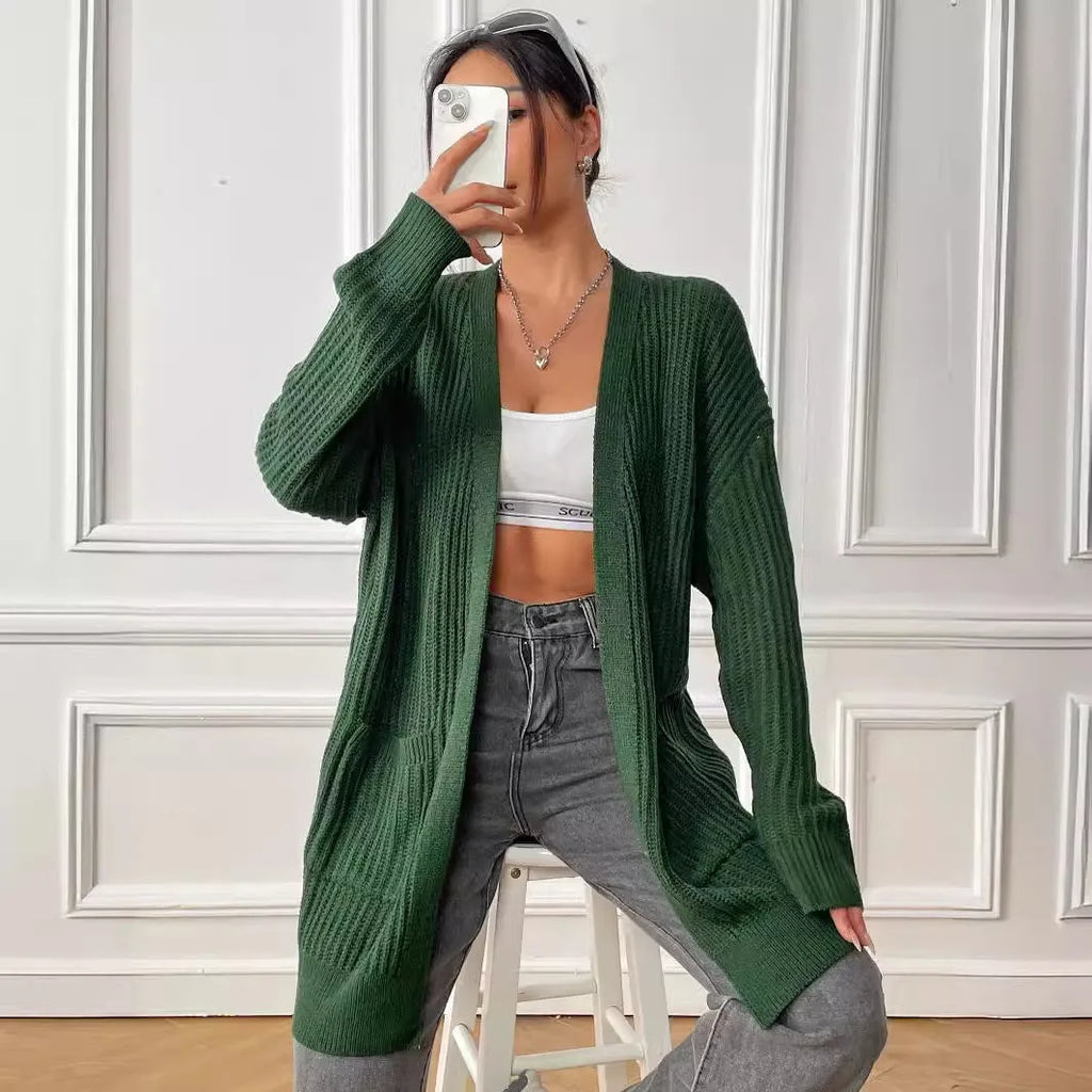 Women's dark green acrylic cardigan with two pockets and long sleeves.