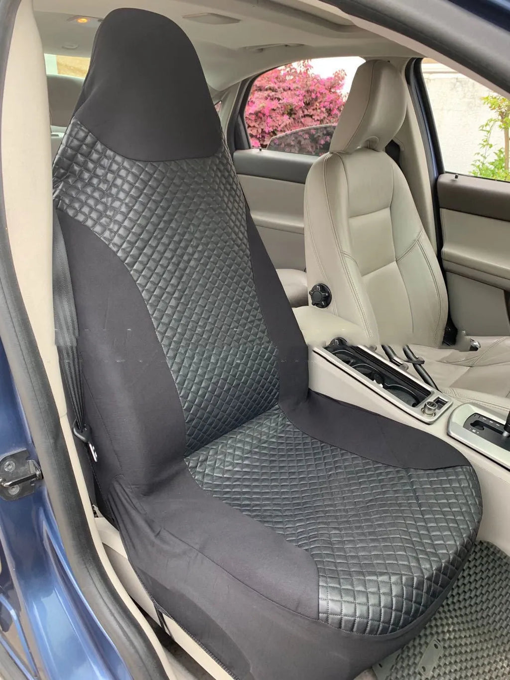 Black quilted universal car seat cover with plastic hook fastening system