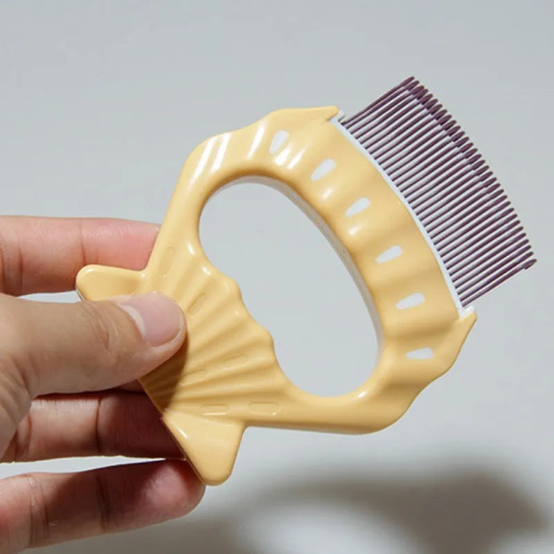 Shell-shaped plastic pet grooming brush with fine bent wire bristles in green colour