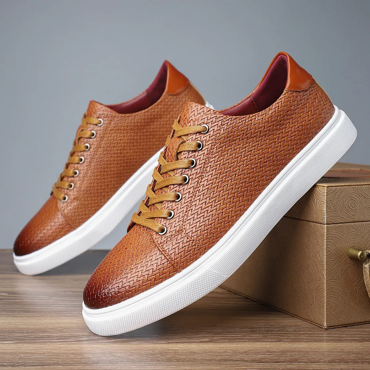 Men's low-top business shoe with artificial PU upper, rubber sole, and stitching detail in black