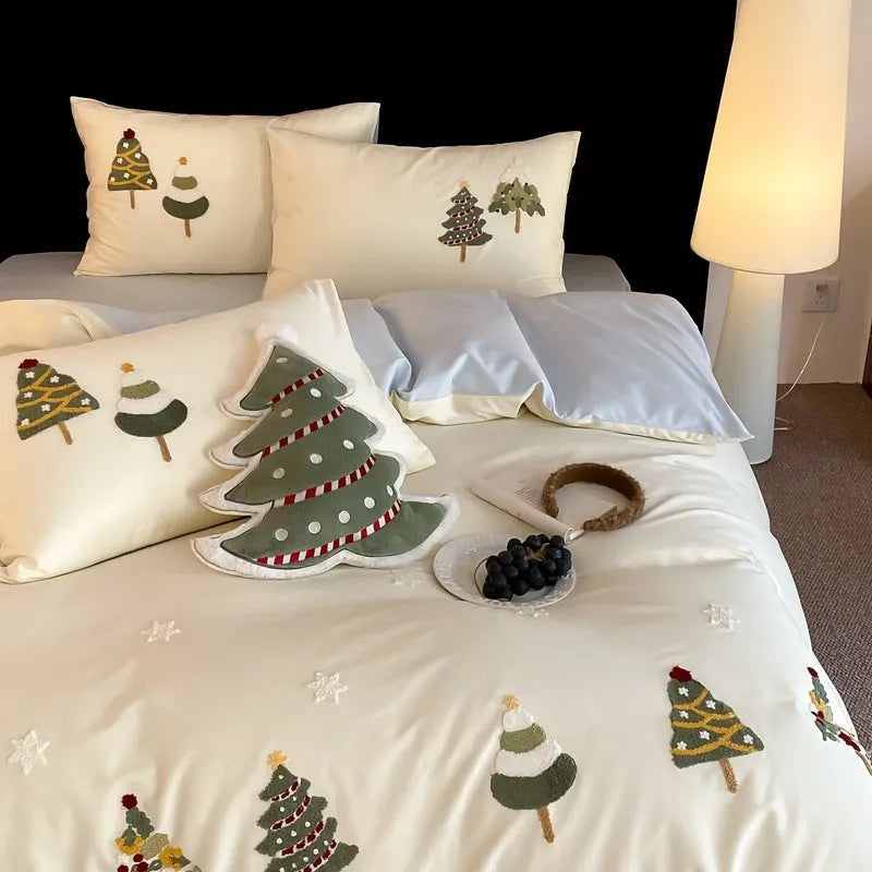 Cream Blue cotton bedding set with embroidered Christmas tree and floral pattern, showing duvet cover and pillowcases.