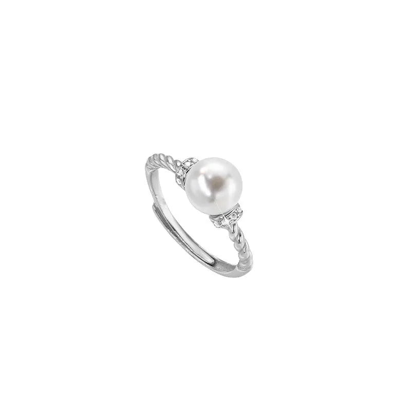 Adjustable copper pearl ring with antique twist geometric design in gold or silver colour