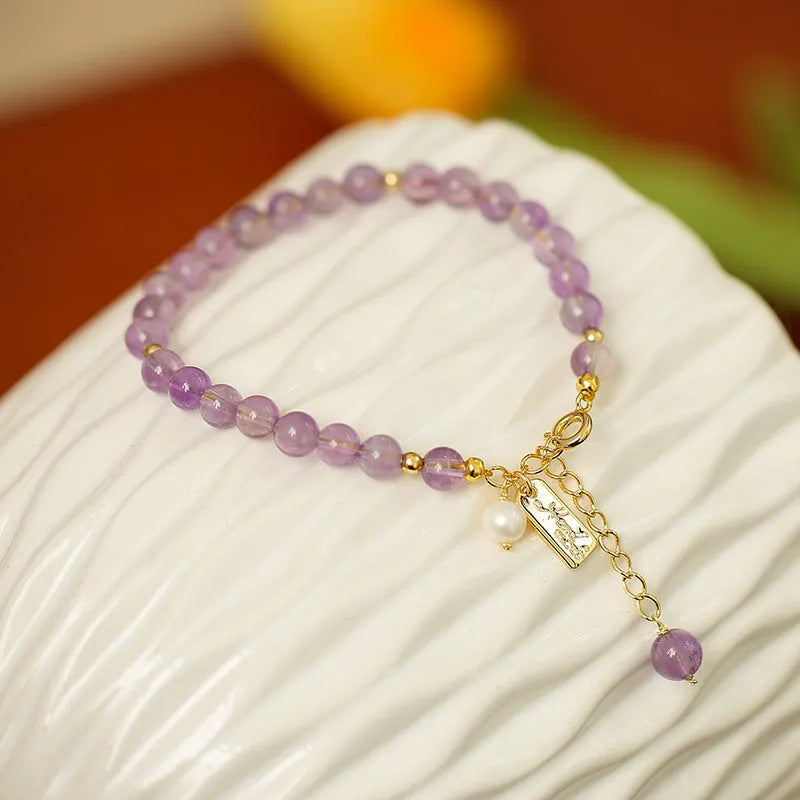Natural crystal women's bracelet with romantic lavender amethyst beads in dark colour