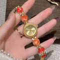 Women's round dial quartz watch in milky white with zinc alloy case and spiral crown.