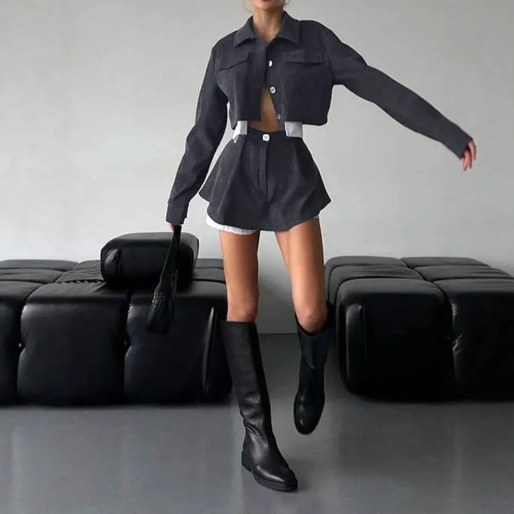 Women's two-piece set with long sleeve cardigan and cake short skirt in black, with blended fabric.