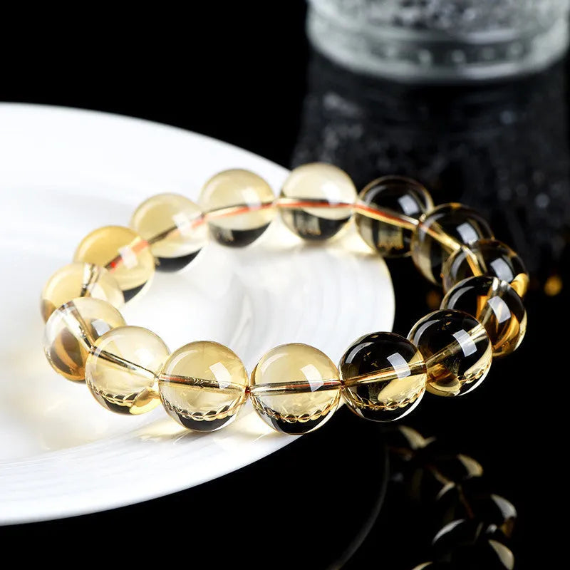 Natural citrine scattered bead bracelet in 7A or 6A grade on a wrist, showing five size options.