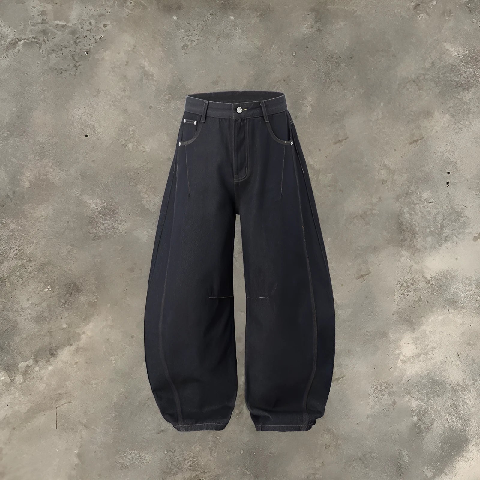 Men's original cow colour wide-leg denim trousers laid flat, showing mid-waist and full-length legs.