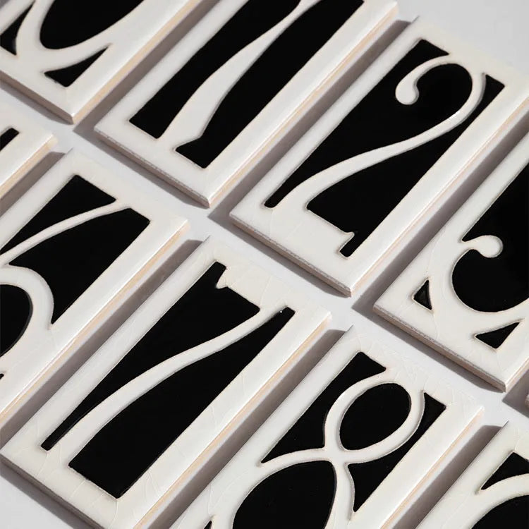 Handmade ceramic retro doorplate with white enamel numbers on blue background, measuring 76mm by 152mm