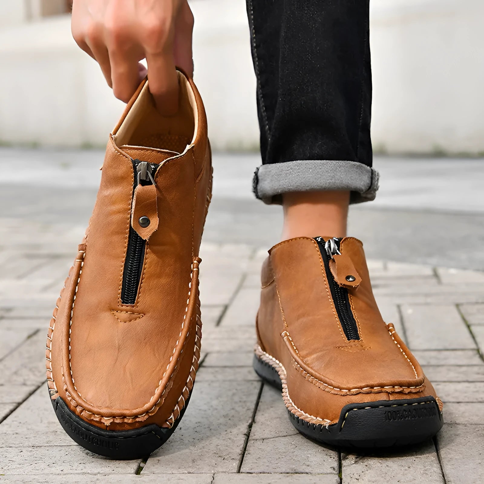Men's black slip-on leather loafers with round toe and rubber sole
