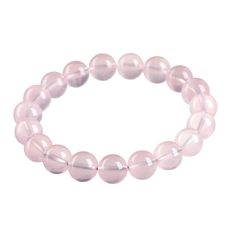 Natural starlight crystal round bead bracelet with polished finish in pink colour options