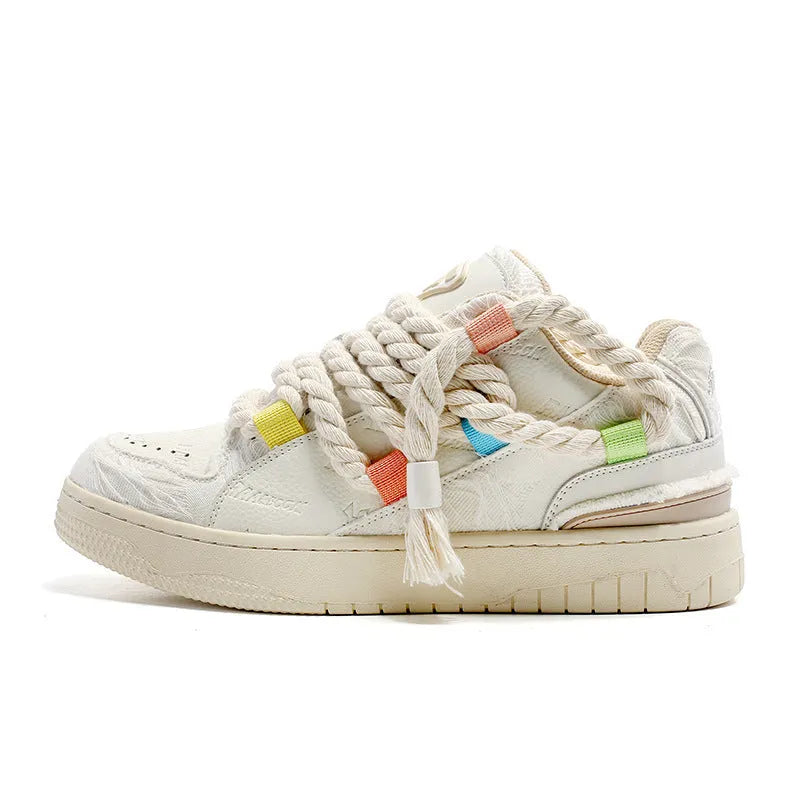 Creamy white retro skateboard shoes with old damage style, lace-up front, platform heel and round toe