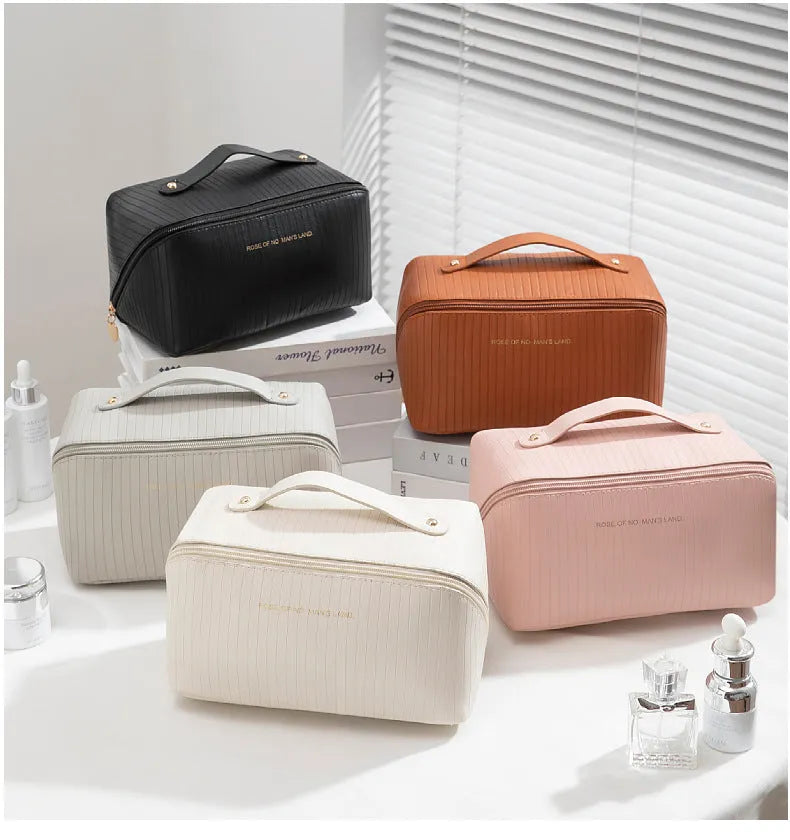 Vertical pattern makeup bag with cubic 22.5cm dimensions in beige, black, brown, grey, and pink colour options