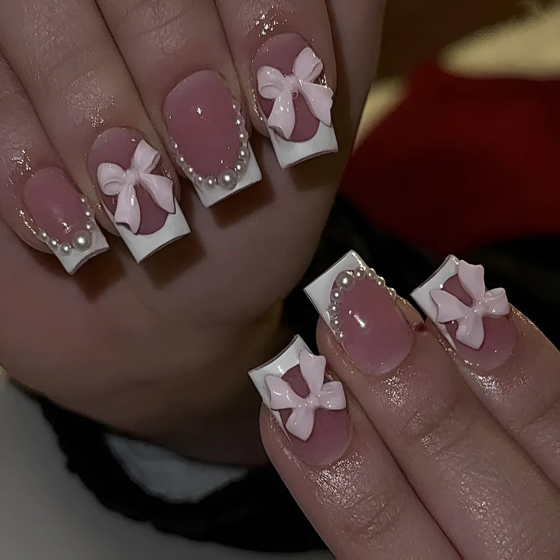 Set of short false nails with white French manicure, tulip, bow, starry sky, and leopard print designs.